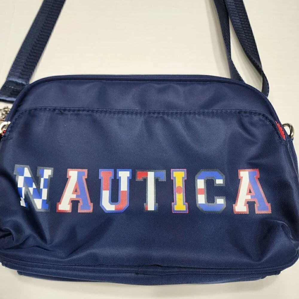 Nautica belt bag or crossbody Navy multi colored letters red zipper